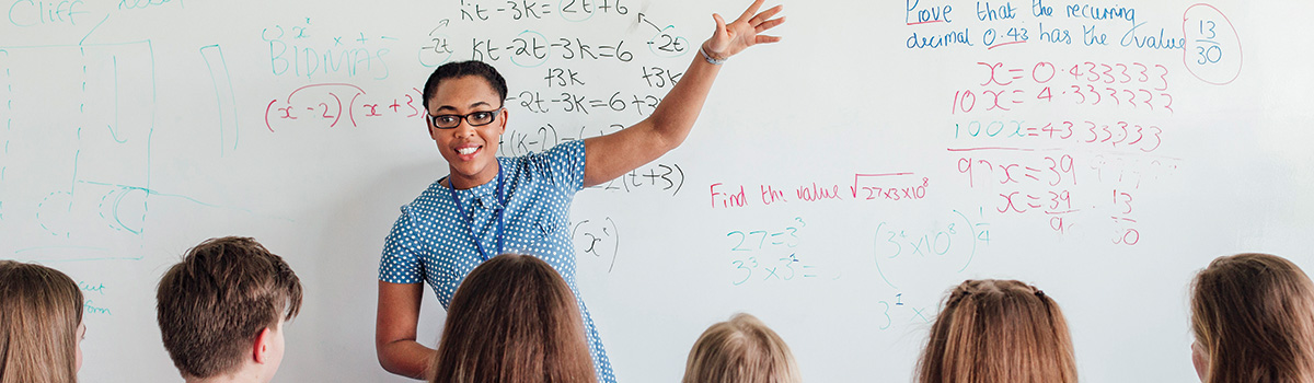 math instructor at white board