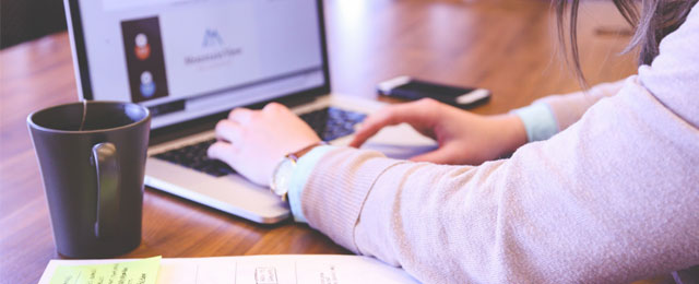 hand on computer keyboard