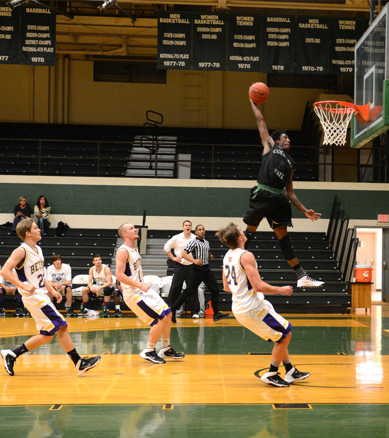 basketball player dunking the ball