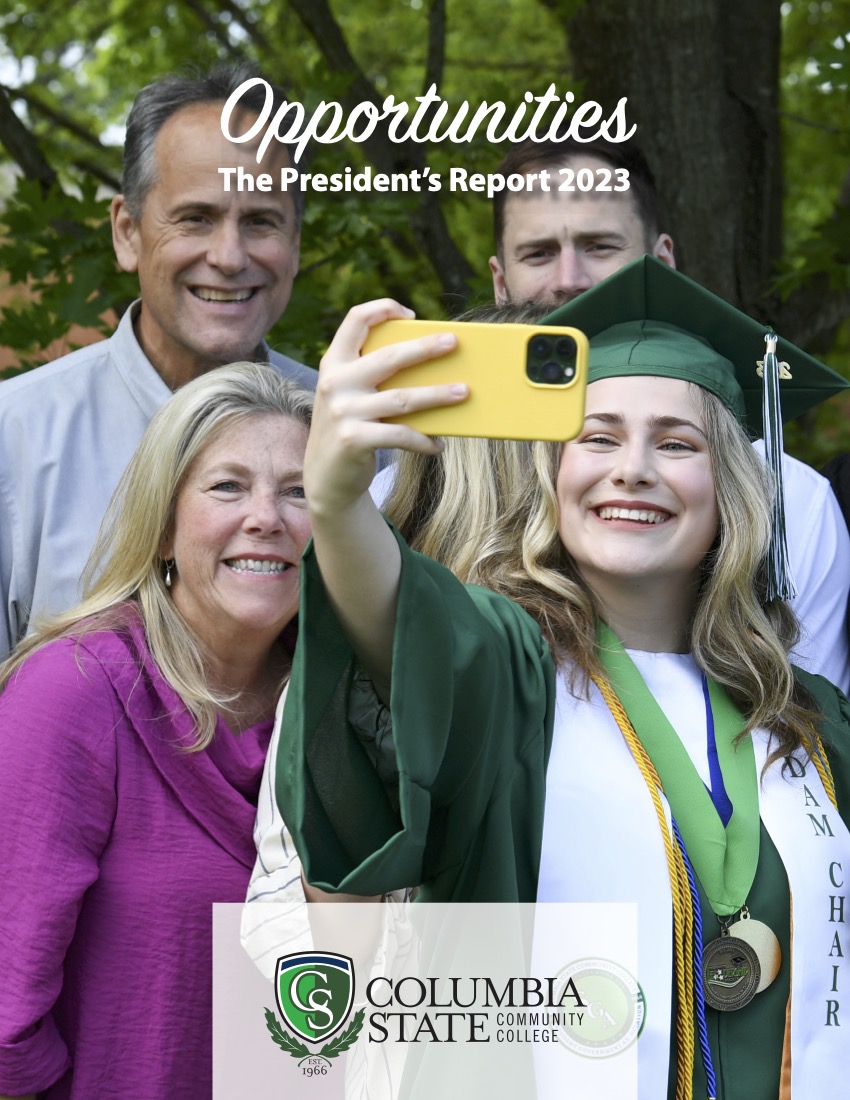 Graduate smiling with family