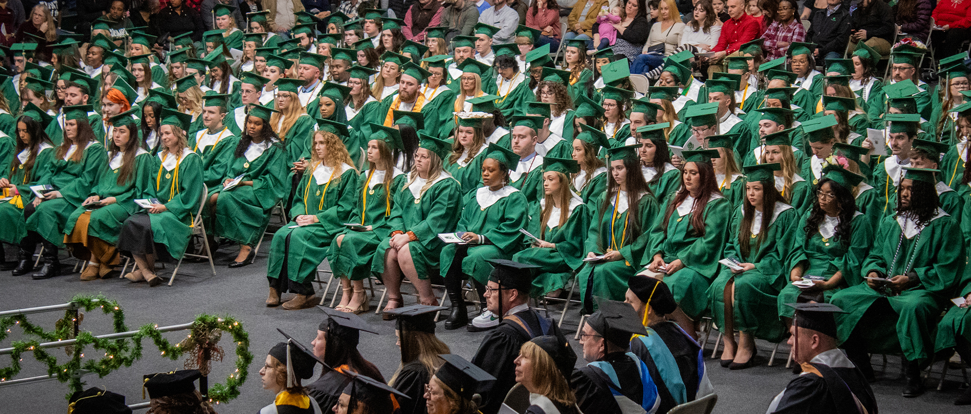 Crowed of students in the audience at Commencement