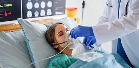 A woman being put under the effects of anesthesia