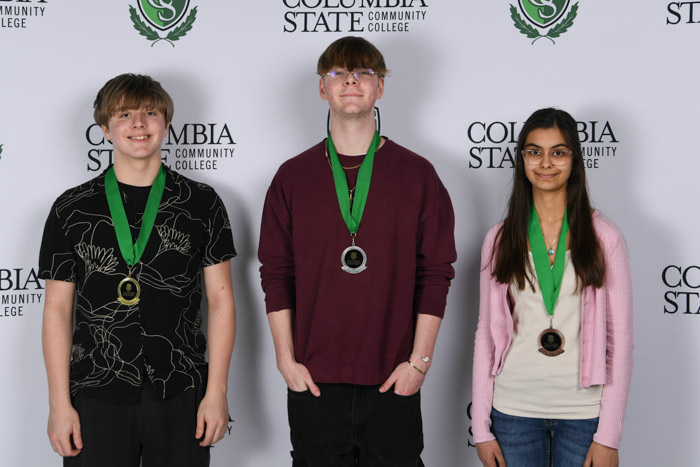 Piano Performance Winners (left to right): First place winner, Logan Bates of Spring Hill High School; second place winner, Timothy Merritt of Richland High School; and third place winner, Maya de Koning of Summitt High School.