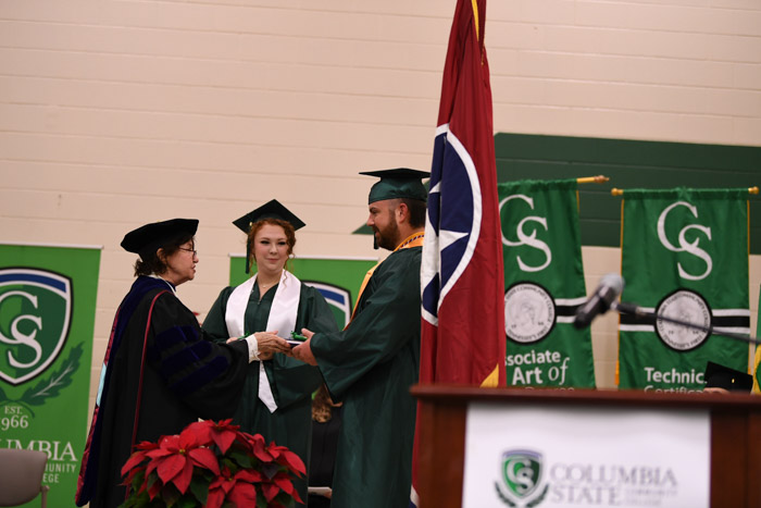 Students received the President’s Leadership Society medallion for completing all requirements of the leadership training program prior to graduation. Throughout the program, students attend a leadership retreat, enjoy exposure to the arts, participate in workshops and campus life, develop civic understanding and give back to the community through service. (Pictured, left to right): Dr. Janet F. Smith, Columbia State president, Faith Kennedy and Robert Perry Austbrooks. 