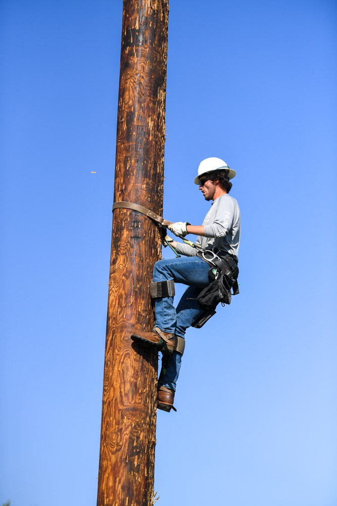 Chase Runions from Columbia completes the 80-foot pole climb.