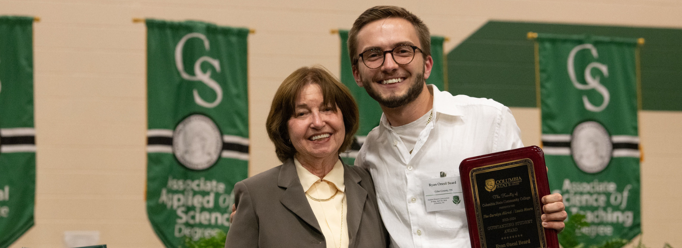 Ryan Oneal Beard received the Carolyn Allred/Lewis Moore Outstanding Student award. Pictured with Dr. Janet F. Smith, president of Columbia State (left).