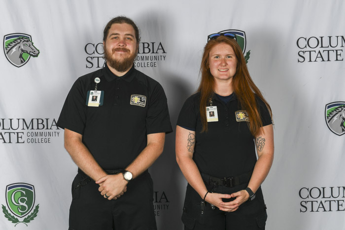Pictured (left to right): Bedford County paramedic graduates Colin Bain and Aubrea Curtis.