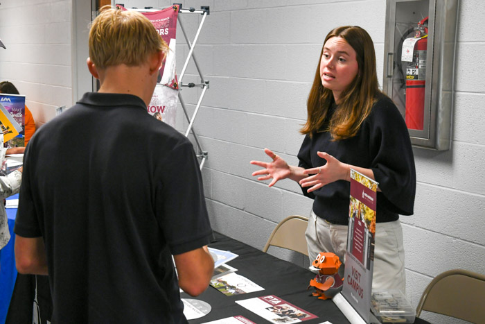 A Freed-Hardeman University recruiter speaks to a Maury County high school student.  