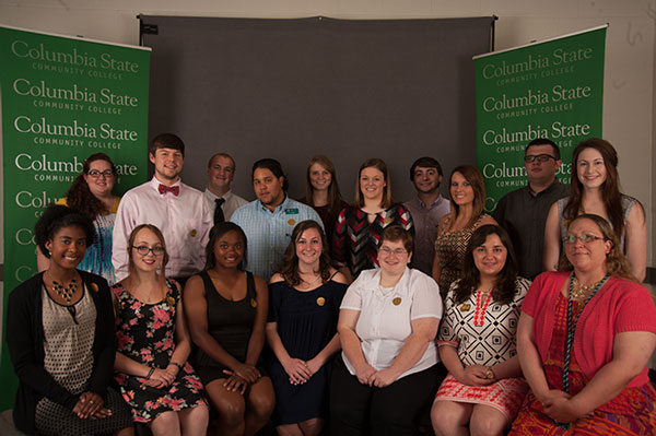 A group of Columbia State students smile at honors convocation