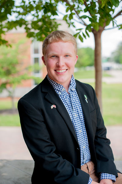 Blond male student smiling