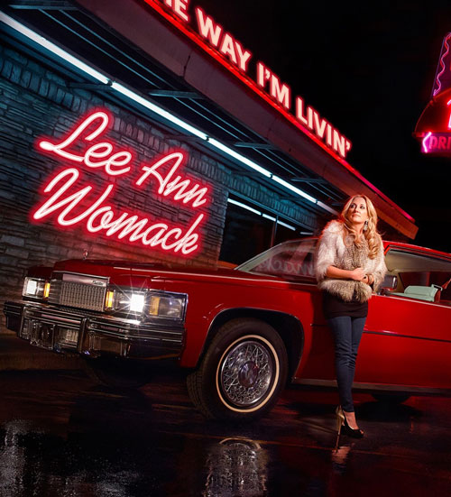 Woman Standing in front of car